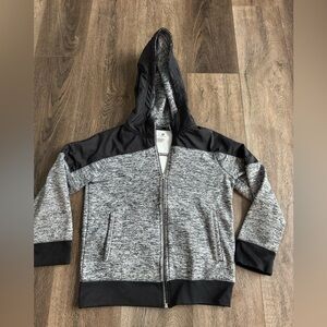 Xersion lightweight jacket.  Black and grey.  Boys size small.